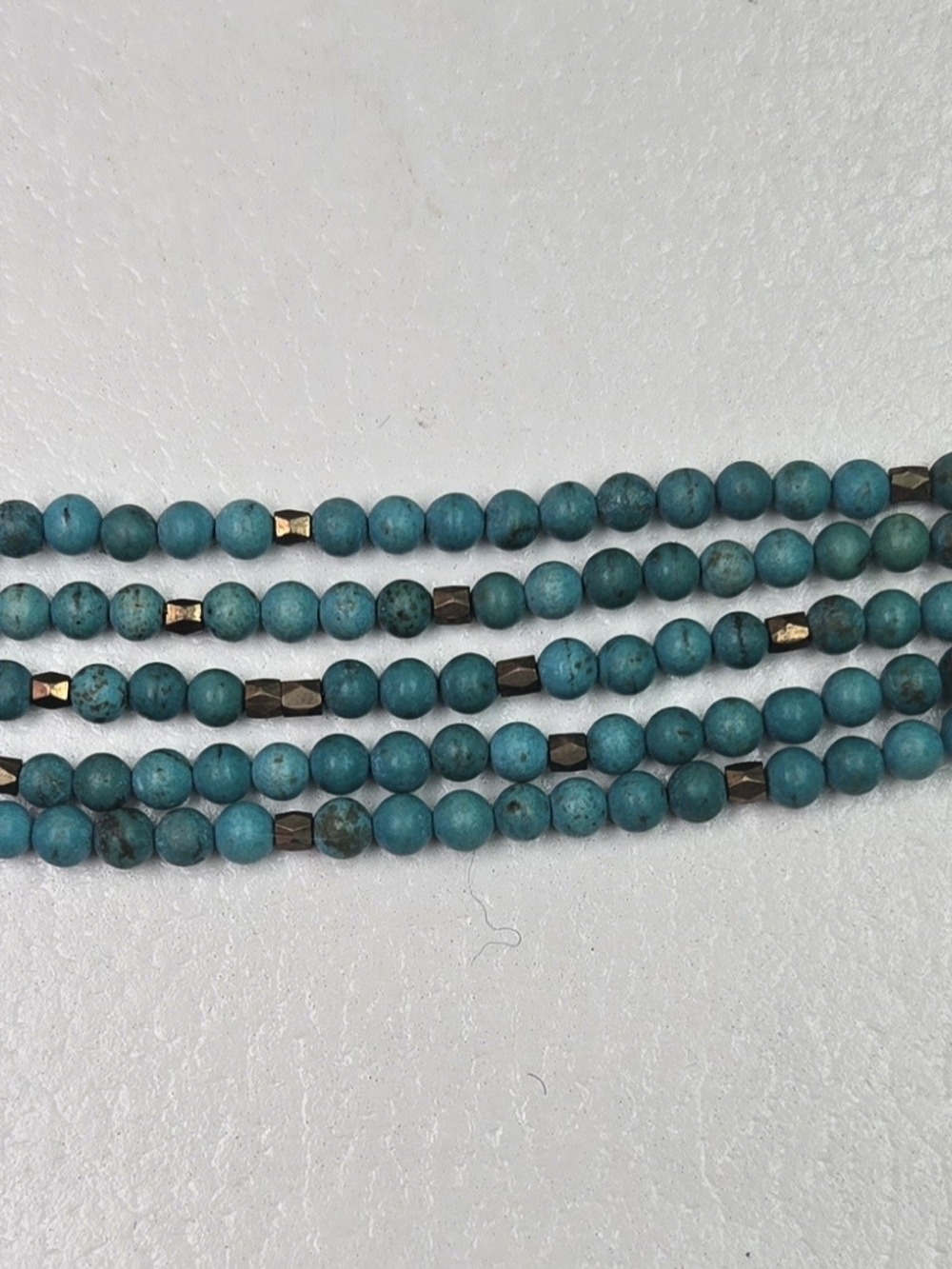 leather bracelet featuring multiple strands And Turquoise Beads
